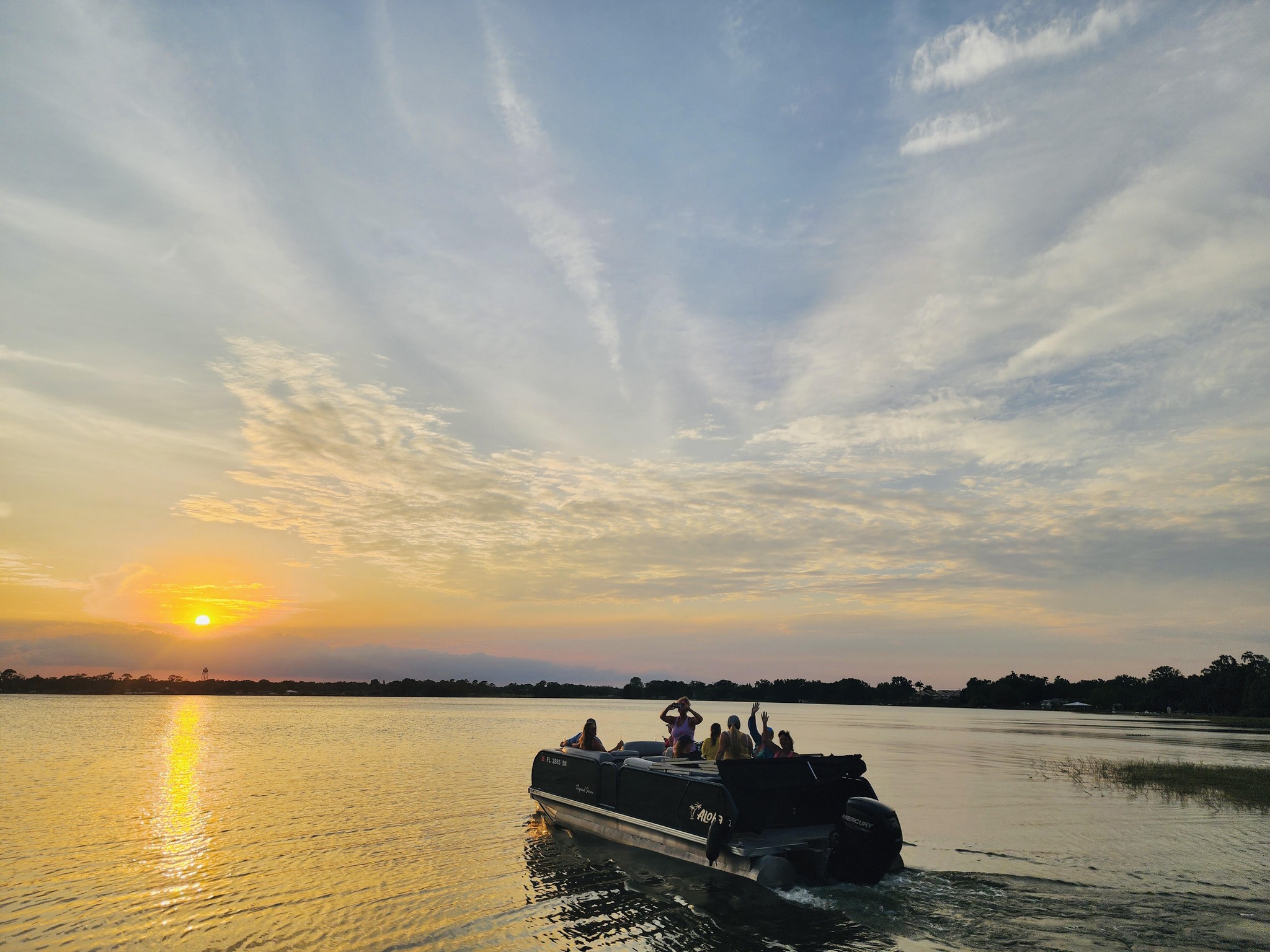 Sunset cruise by pontoon boat at Central Florida water sports