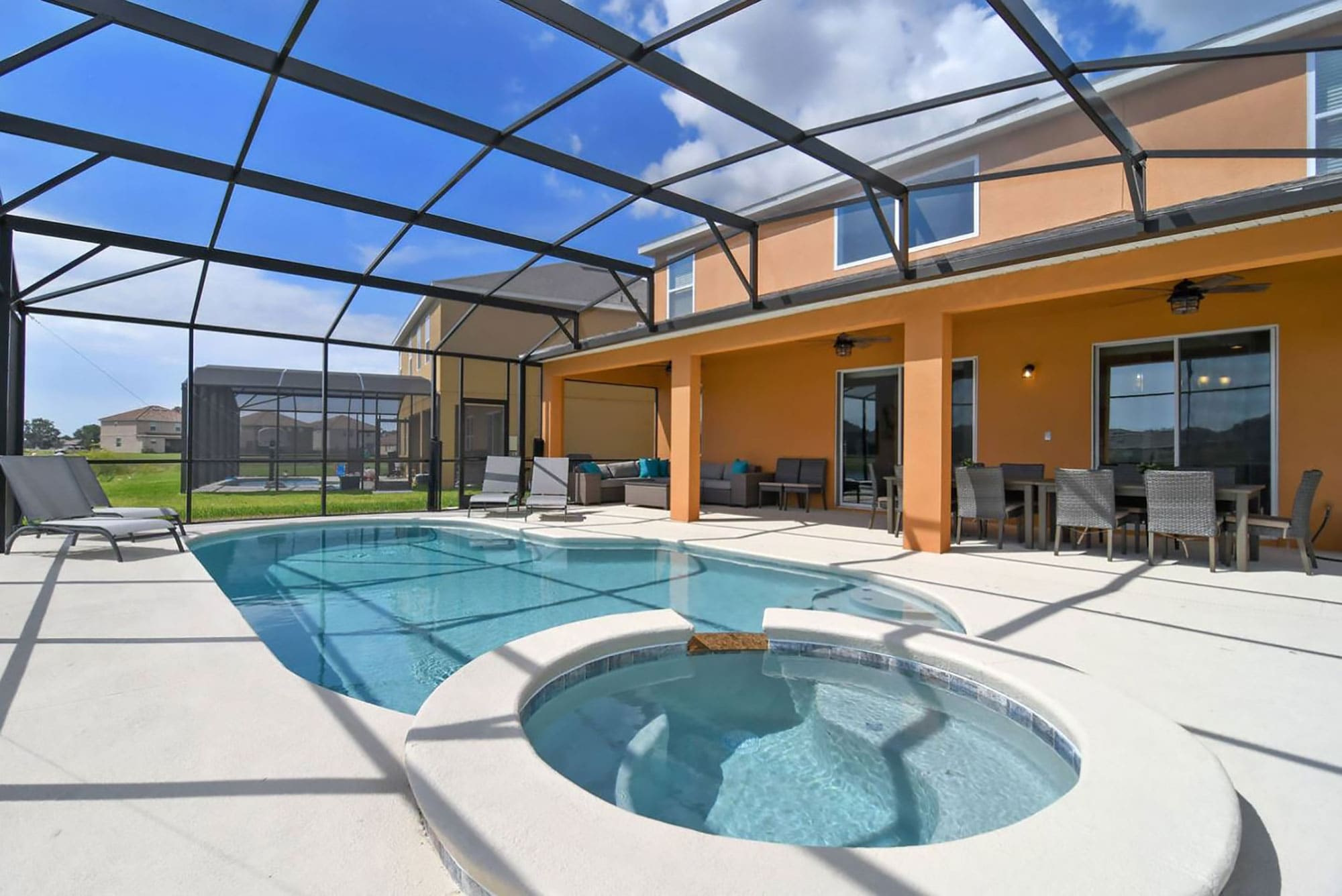 Pool and hot tub area of two story vacation rental home managed by An Owners Dream Management in Davenport